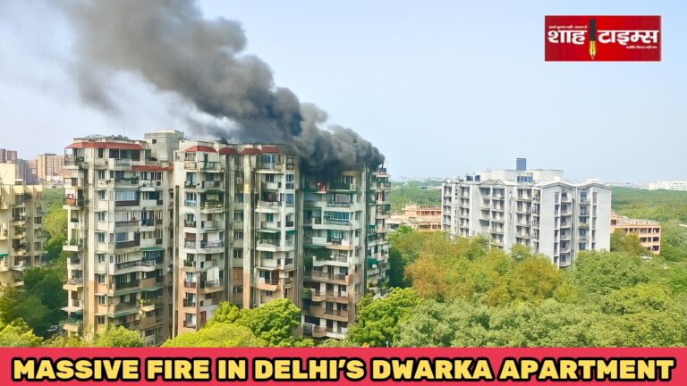Black smoke and fire coming out of a high-rise apartment building in Dwarka, Delhi, as residents and emergency responders gather below – Shah Times