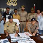 Muzaffarnagar police officers with arrested cyber crime accused and seized items in ₹33.33 lakh Digital Arrest scam | Shah Times