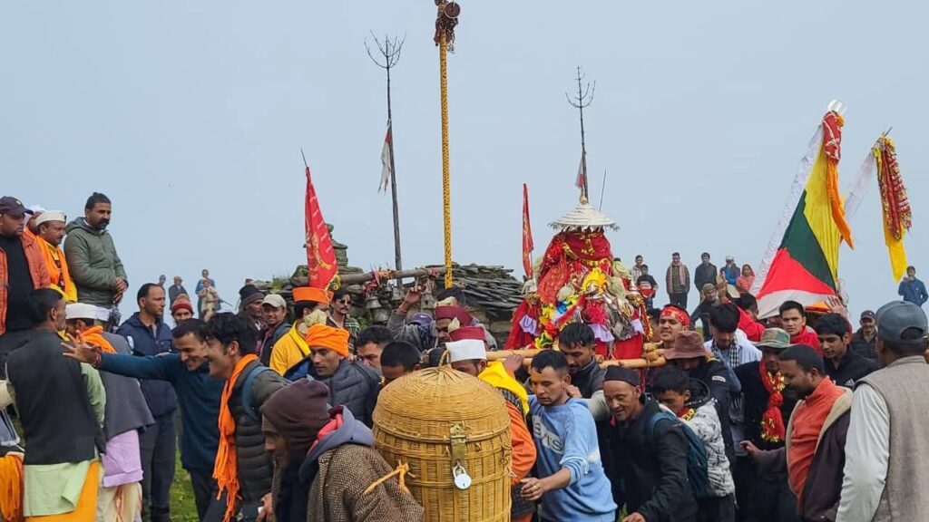 Nanda Lokjat festival devotees carrying Nanda Devi palanquin in Himalayas