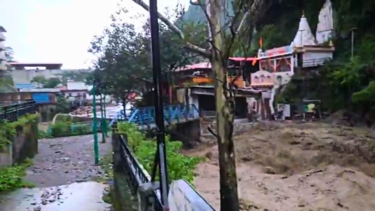 Cloud burst in Dehradun’s Sahastradhara causing destruction, debris flow near temples, damaged hotels and markets, rescue operations underway.
