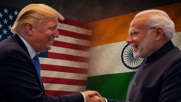 Modi and Trump shaking hands with Indian and American flags in the background, representing strong India–US relations.
