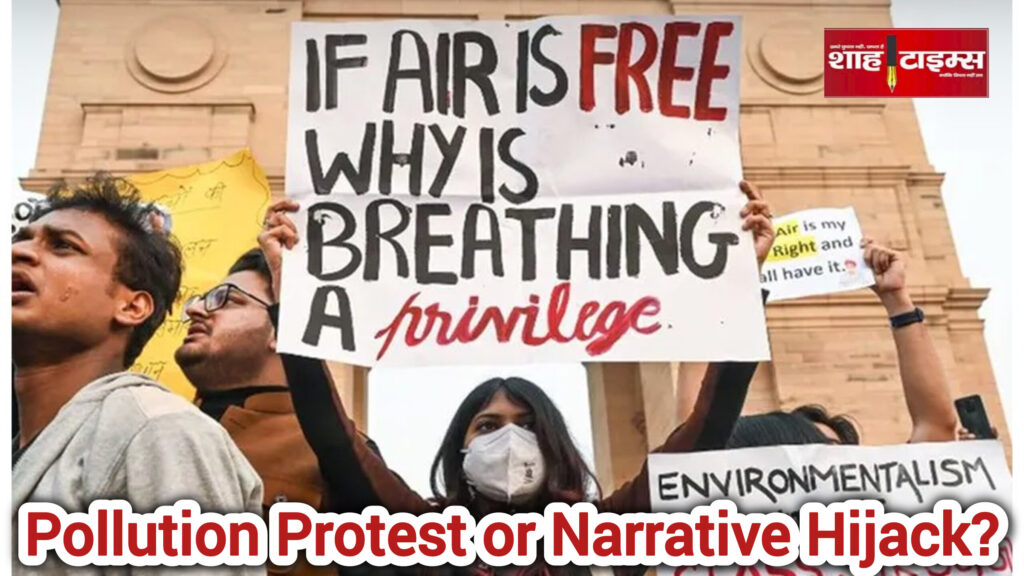 Crowd wearing masks holding air pollution protest placards at India Gate, including a bold Clean Air message, protesters visible in a public health awareness demonstration, Shah Times photo frame